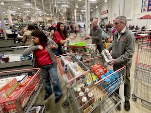 Donna, Deanna, Dante, and Andrew at Costco checkout